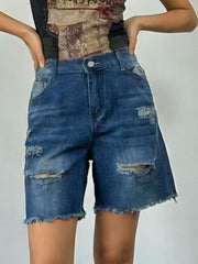 Distressed dark blue denim shorts with frayed hem and ripped details.