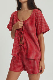 Deep red plaid cotton open-front top with tie closure and matching shorts