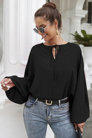 Black voluminous sleeve keyhole blouse with tie neck detail