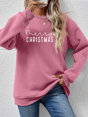 Blush pink sweatshirt with white Merry Christmas graphic, crewneck, long sleeves.