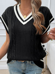 Black cable knit vest with white striped V-neck and armbands.