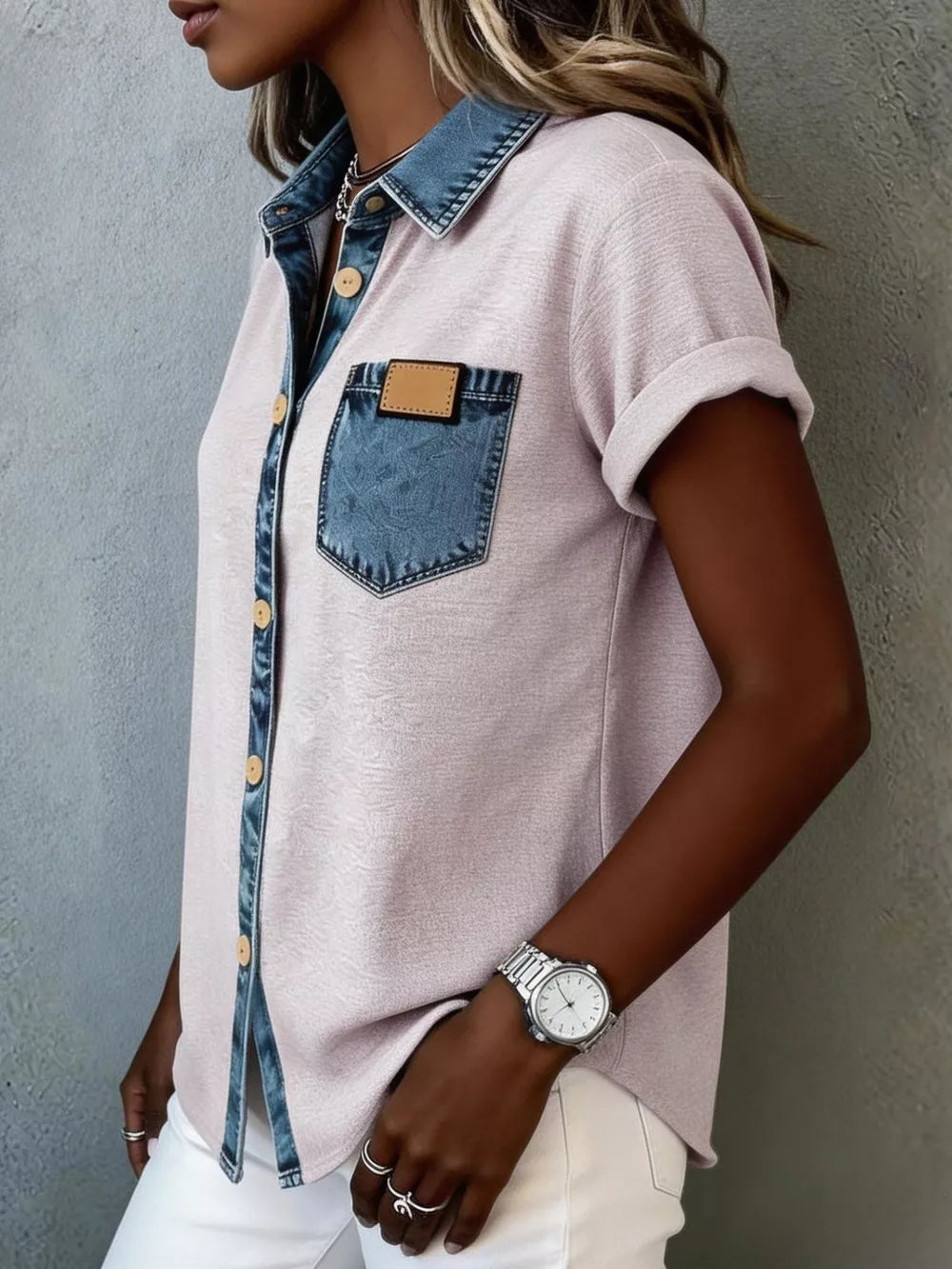 Pink heathered short sleeve maternity shirt with denim collar, placket, and pocket.