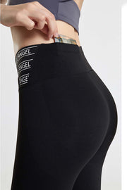 Black active leggings with repeating Angel logo waistband detail.