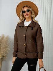Chocolate teddy textured jacket with leatherette trim and button closure.