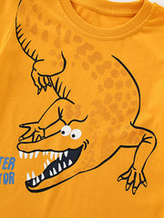 Yellow toddler t-shirt with a playful alligator graphic and dotted texture.