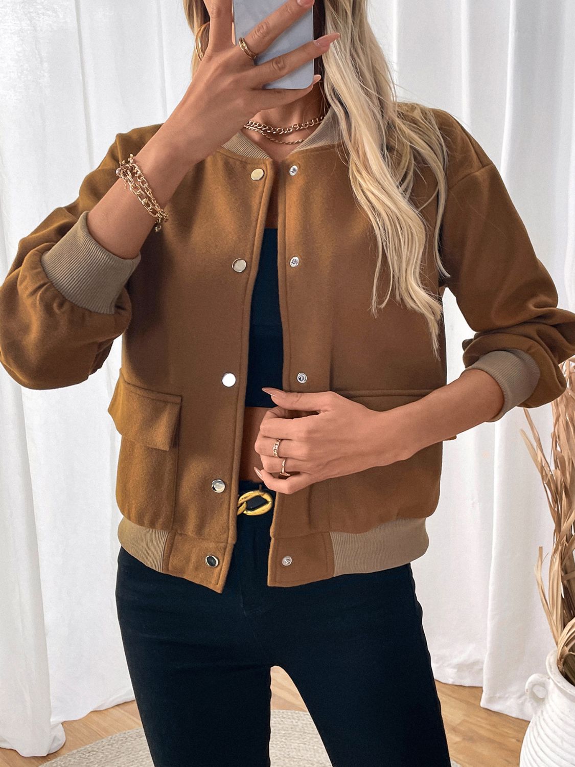 Caramel felted wool-blend bomber jacket with button closure and ribbed cuffs.