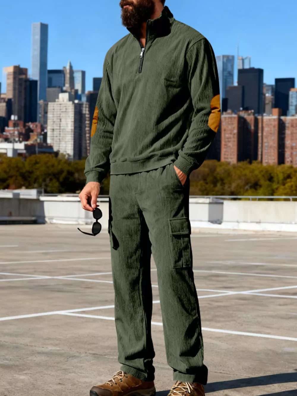 Olive green casual two-piece set with quarter zip pullover and cargo pants, featuring elbow patches.