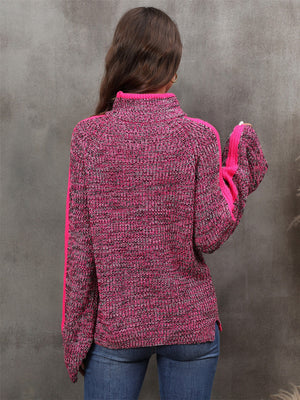 Colorblock raglan sleeve turtleneck knit sweater in cerise with contrasting pink stripe detail.