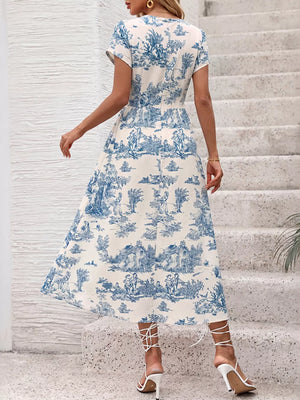 Toile print midi dress with V-neck, short sleeves, and a-line skirt.