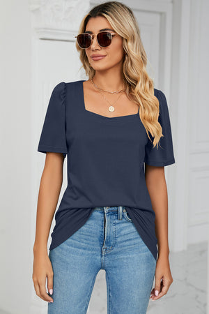 Dark blue tee with square neckline and sculpted short sleeves.