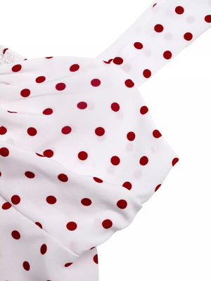 White polka dot camisole with ruched detail and tie straps
