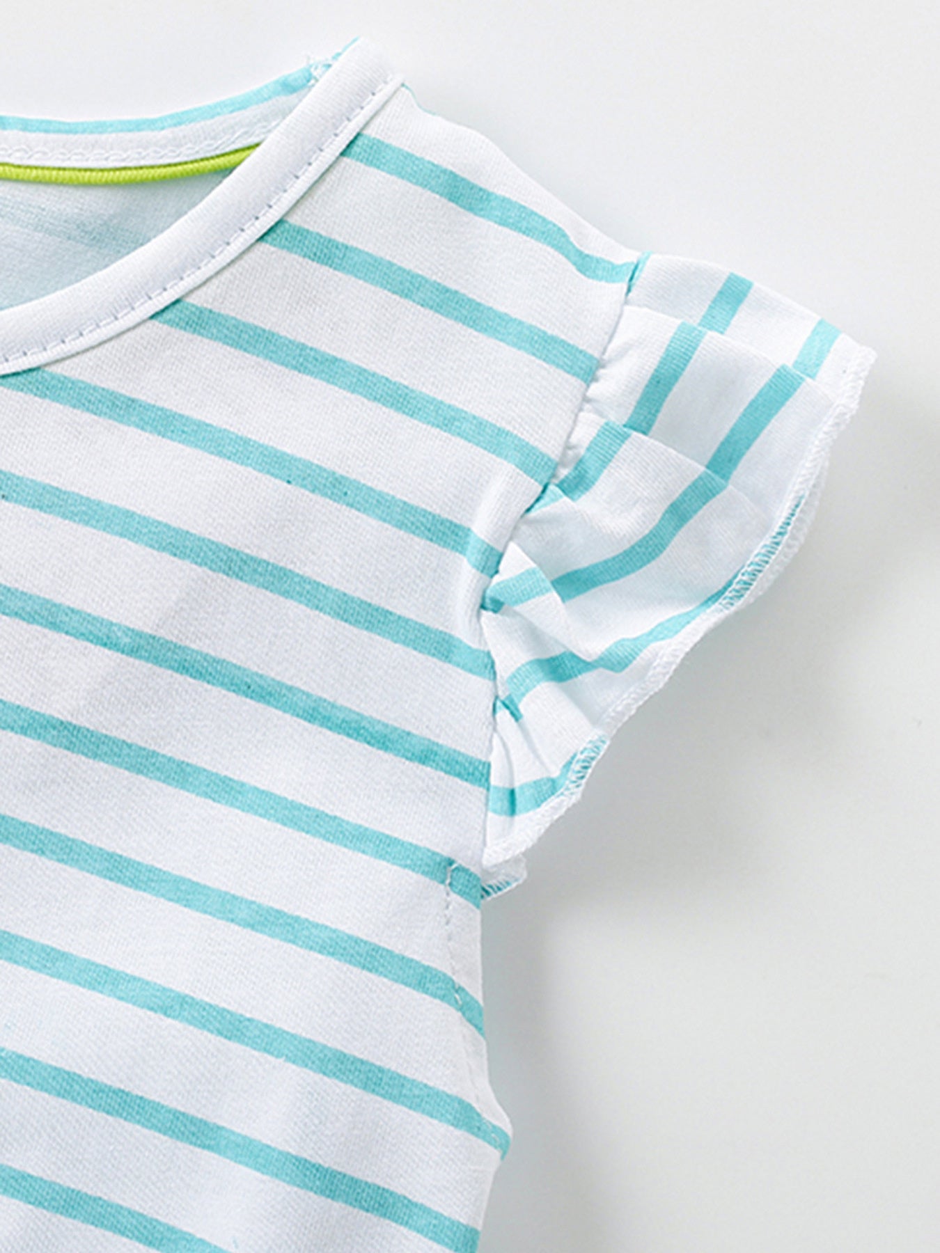 White and blue striped cotton dress with ruffled sleeves and green trim neckline.