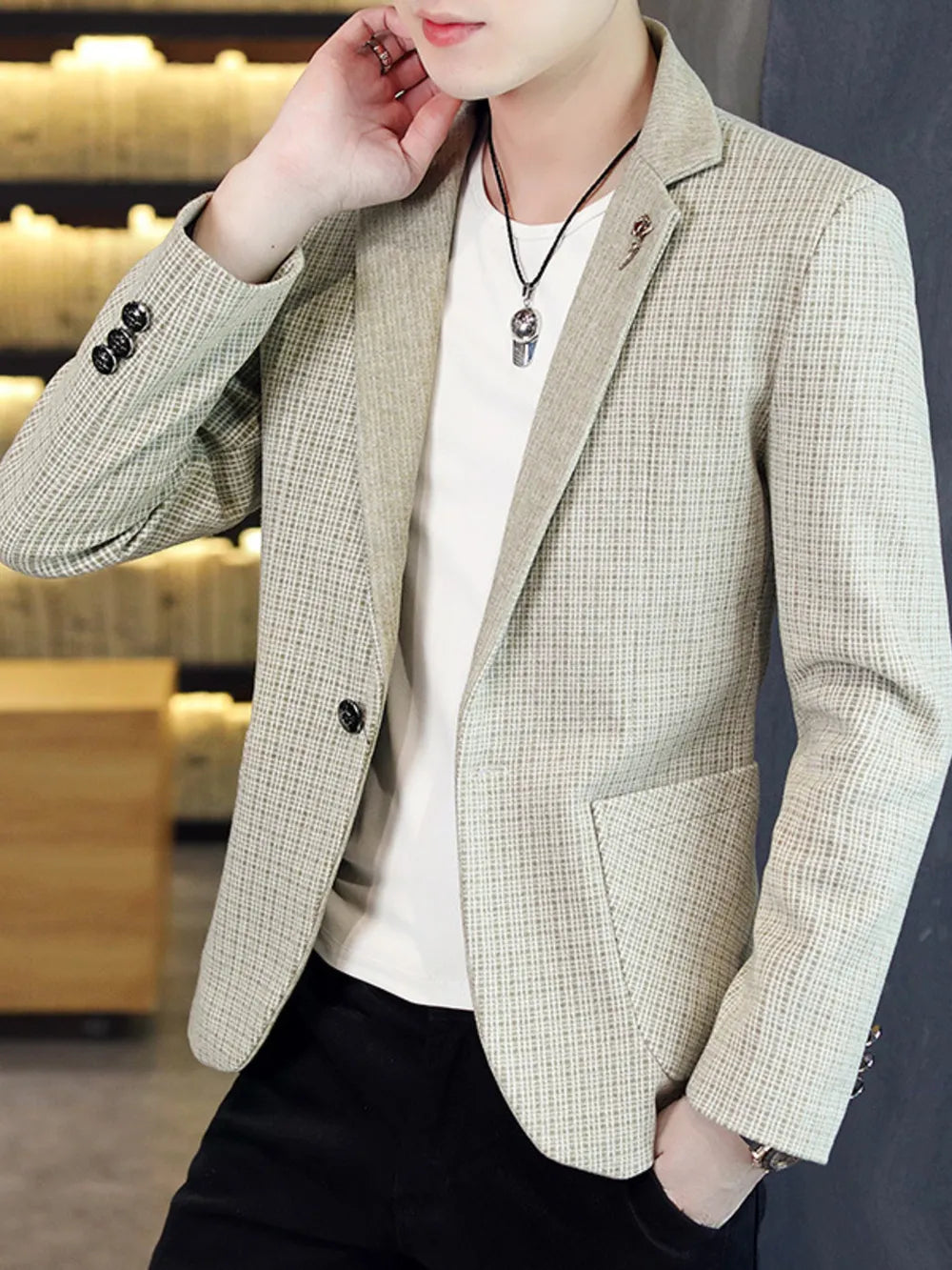 Men's slim fit blazer in light gray micro-plaid with a single button closure and notched lapel.