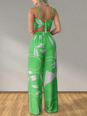 Light green tropical print crop top and wide-leg pants set with tie back detail.