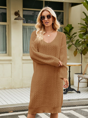 Camel textured knit v-neck midi dress with long sleeves and a relaxed fit.