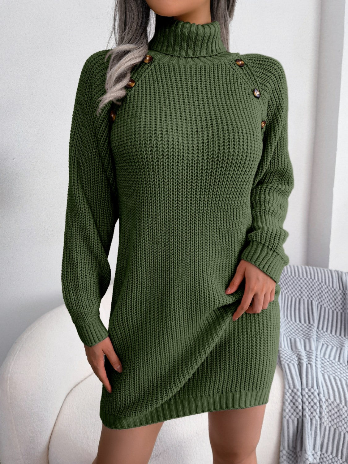 Dark green ribbed knit turtleneck sweater dress with shoulder buttons