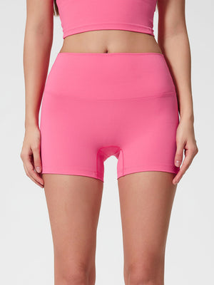 Nova Rise High-Motion Shorts in Fuchsia Pink, seamless high-waisted activewear shorts.