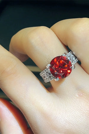 Crimson solitaire ring with pave band, scarlet stone, silver tone metal