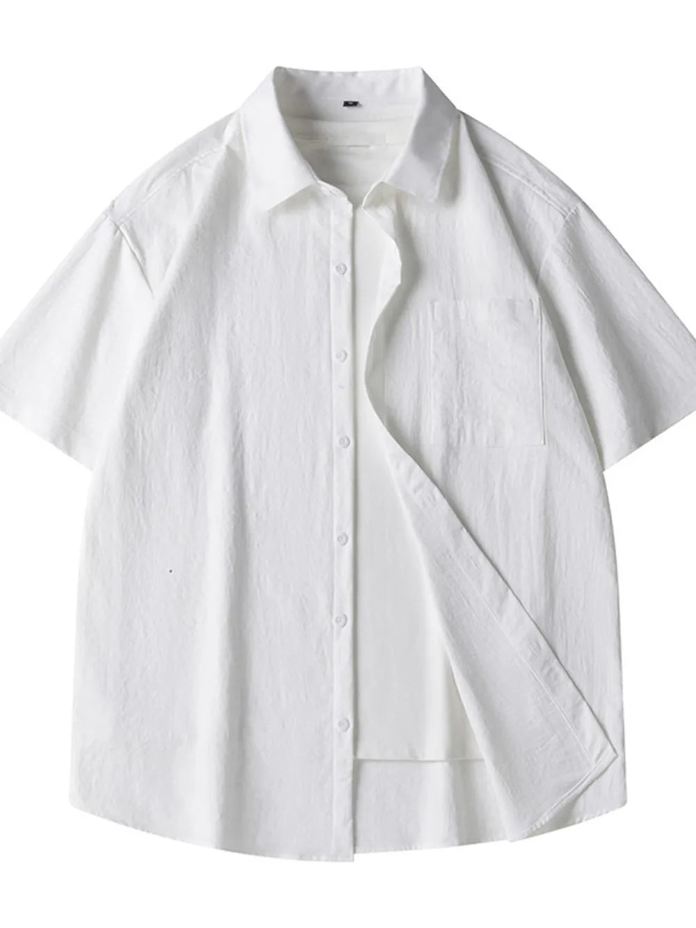White relaxed fit button-up shirt with short sleeves and chest pocket.