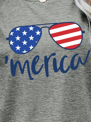 Gray graphic t-shirt with aviator sunglasses and 'merica script in blue.