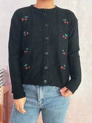 Black cherry embroidered button up cardigan with scalloped trim and ribbed details.