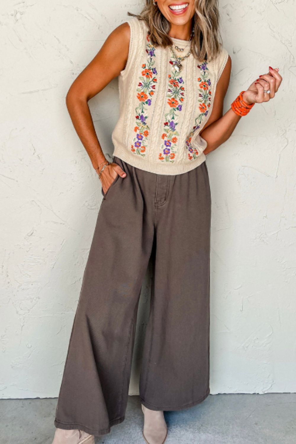 Beige cable knit vest with floral embroidery and crew neck