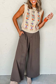 Beige cable knit vest with floral embroidery and crew neck