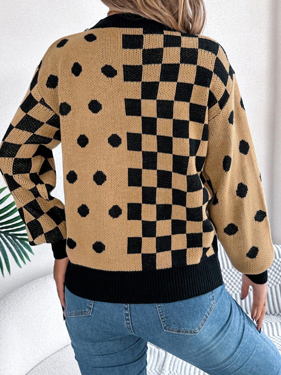 Camel knit sweater with checkerboard and polka dot intarsia pattern, crew neck, long sleeves.
