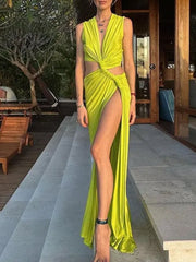 Lime green twisted cutout maxi dress with deep V-neck and high slit.