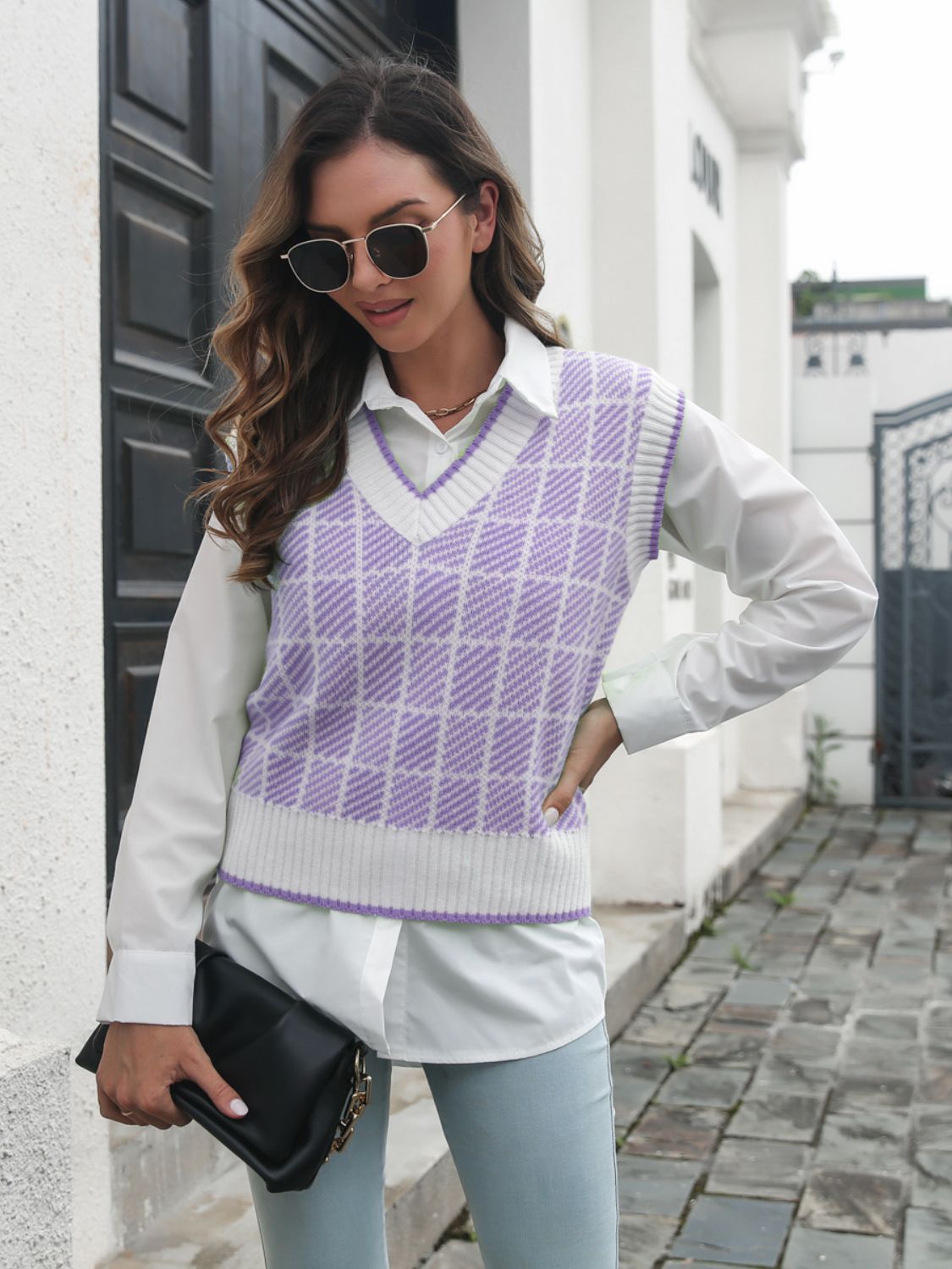 Plaid knit vest in lavender and white with V-neck, layered over a white shirt.