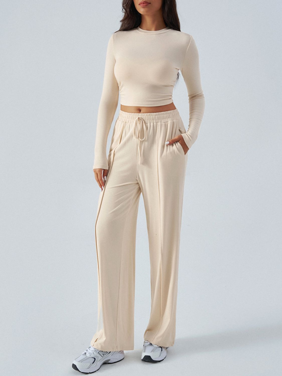 Tan ribbed knit crop top and wide leg pants set with drawstring waist