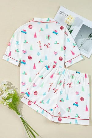 White cotton pajama set with festive Christmas print and contrast piping.