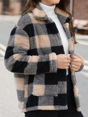 Plaid sherpa overshirt jacket with a button front and collar in black and tan.