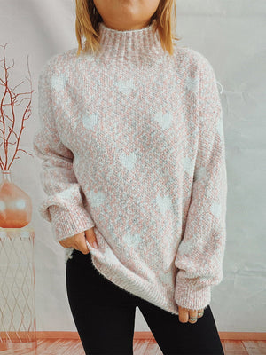 Textured turtleneck sweater in blush pink with a heart motif, acrylic knit