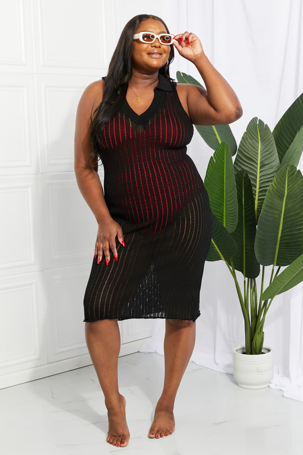 Black open-knit collared midi cover-up with a V-neck and sleeveless design.