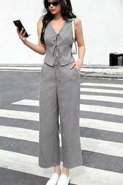 Gray lace-up tie front crop top and wide leg pants set with V-neckline.