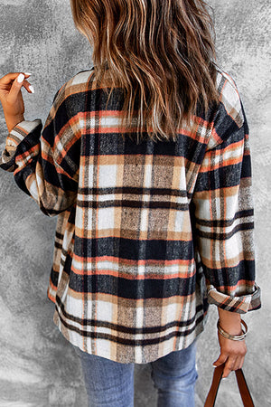 Soft plaid shacket with patch pockets in black, white, tan, and orange.