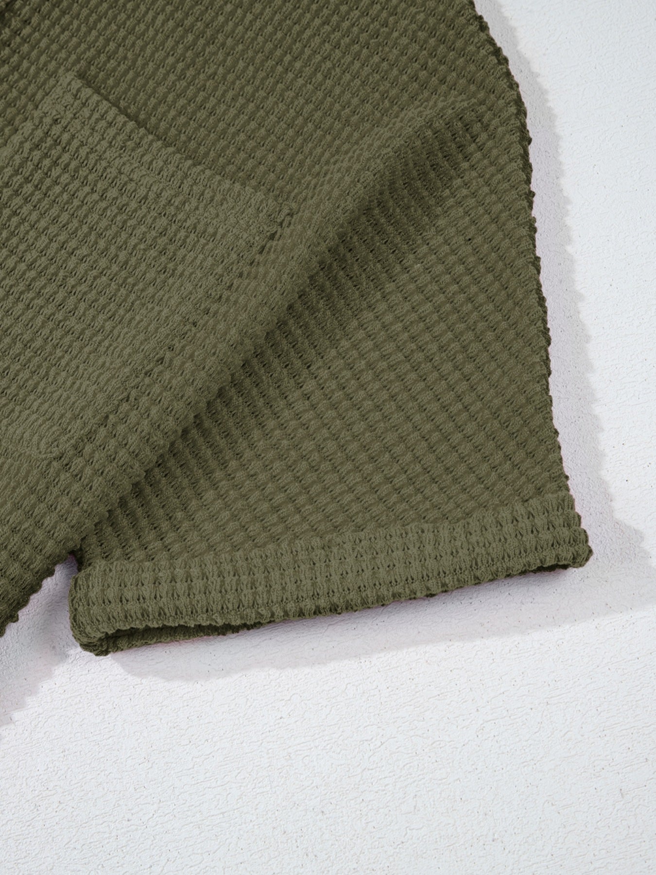 Moss waffle-knit polo shirt with button detail and chest pocket