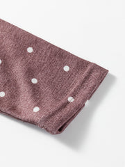 Boat neck polka dot long-sleeve tee in coffee brown with white dots.