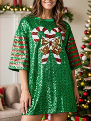Sequin tee dress in green with candy cane and bow graphic, striped sleeves.