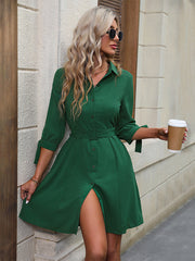 Belted tie-sleeve shirt dress in mid green with button front and A-line skirt.