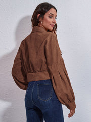 Brown corduroy cropped jacket with balloon sleeves and button details.