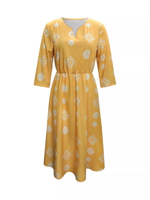 Yellow geometric print midi dress with 3/4 sleeves and notched neckline