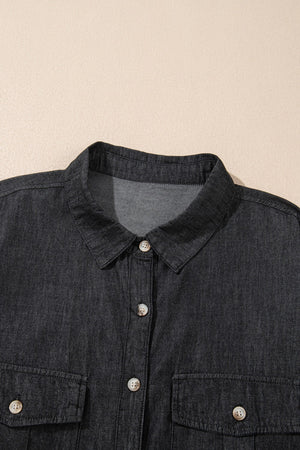 Relaxed black denim shirt with buttoned patch pockets and collar detail.