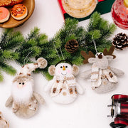 Festive Trio knitted ornaments: Santa, snowman, and reindeer with cozy scarves and hats.