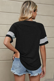 Black raglan sleeve t-shirt with white varsity stripes on sleeves