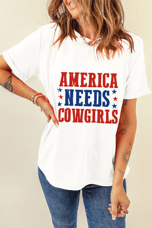 White graphic tee with "America Needs Cowgirls" text and stars.