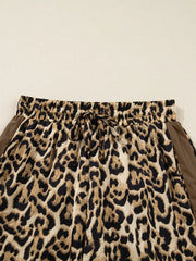 Leopard print two-piece set with drawstring waist and brown side panels.