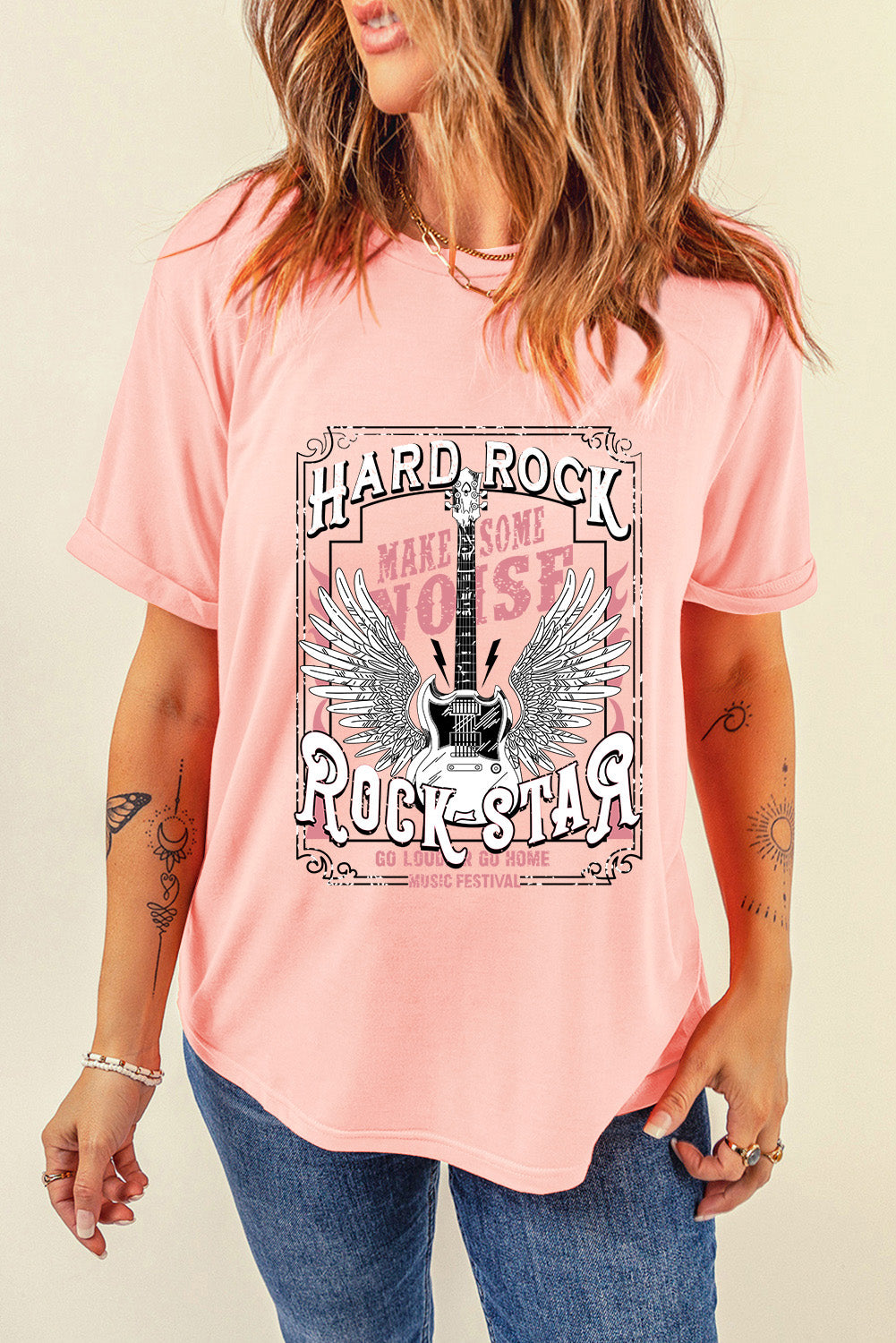 Hard Rock graphic tee in watermelon pink with wings and guitar design.