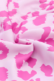 Pink leopard print shorts with scalloped hem detail